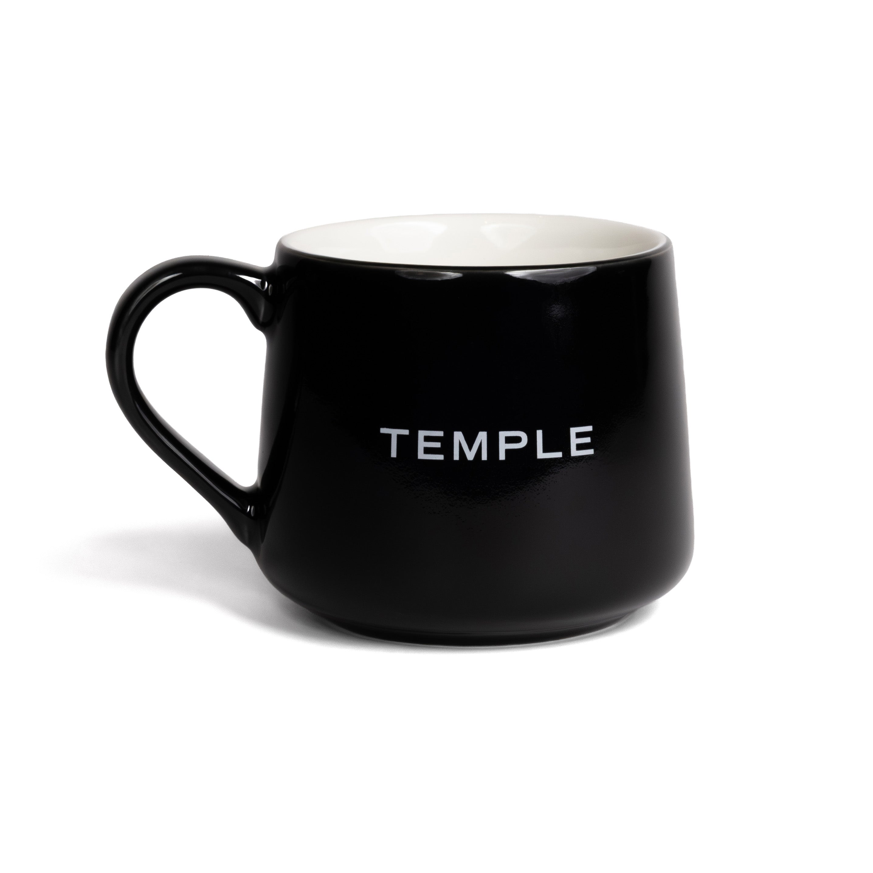 Black mug with 'TEMPLE' text on a white background