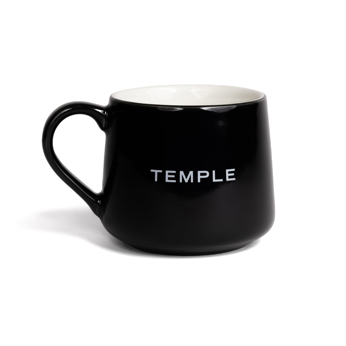Black mug with 'TEMPLE' text on a white background
