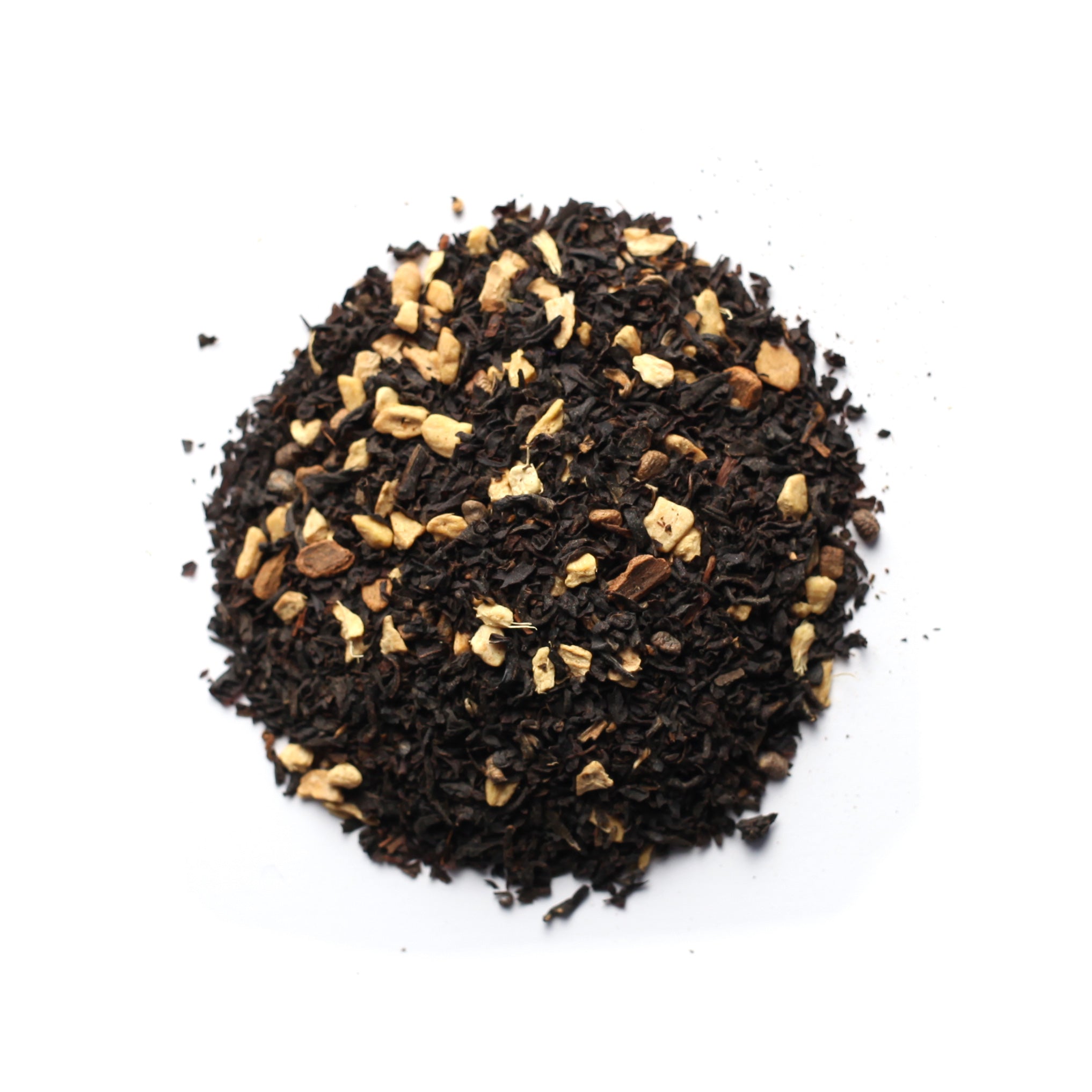 A close-up image of black masala chai tea leaves blended with spices.