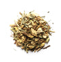 A pile of dried tea leaves and herbs, including pieces of ginger and lemon peel, against a white background.
