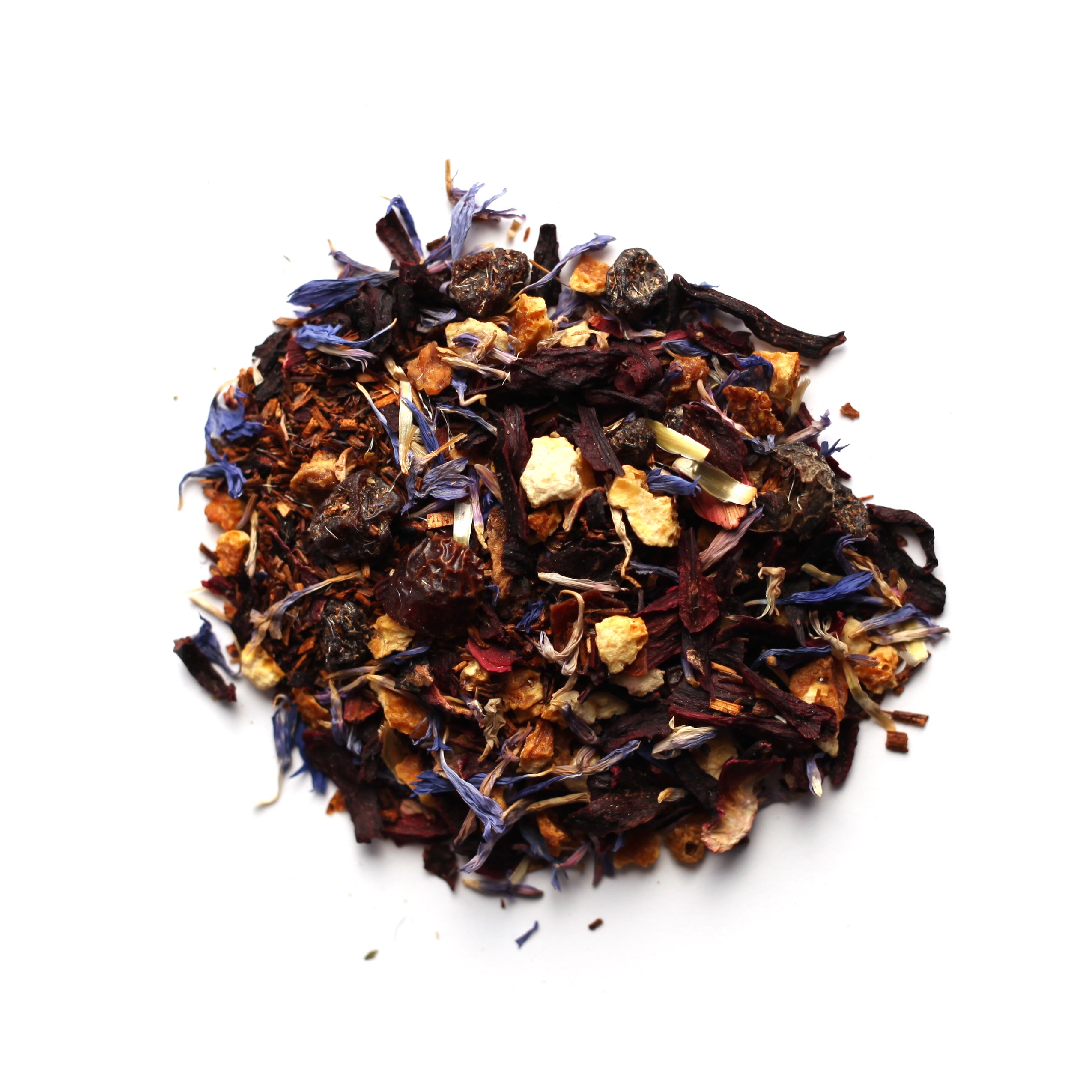 A close-up of a Rooibos herbal tea blend with visible pieces of orange peel, currants, rosehips, hibiscus, and cornflower petals.